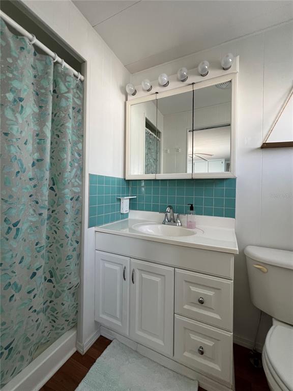 1100 South Belcher Road, Unit 57 Largo, FL 33771 - Photo 26 of 59 a bathroom with a sink and a mirror