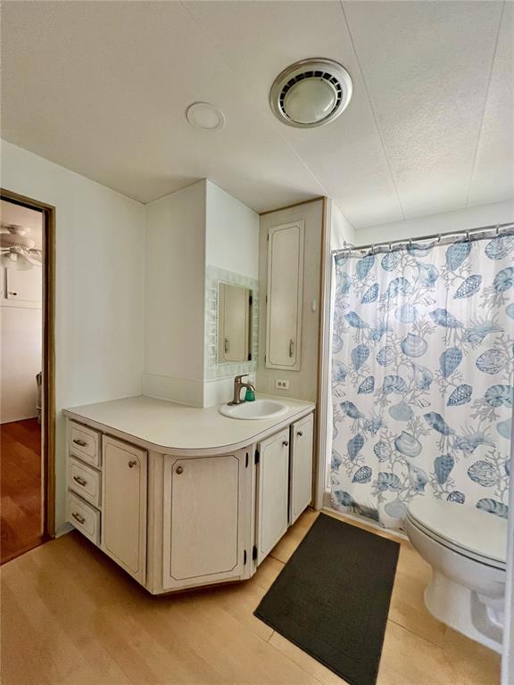 1100 South Belcher Road, Unit 57 Largo, FL 33771 - Photo 32 of 59 a view of a bathroom with a sink and a mirror