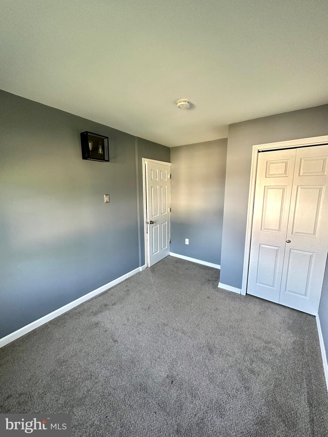 326 Brandon Drive Bear, DE 19701 - Photo 13 of 16 an empty room with a empty space and a window