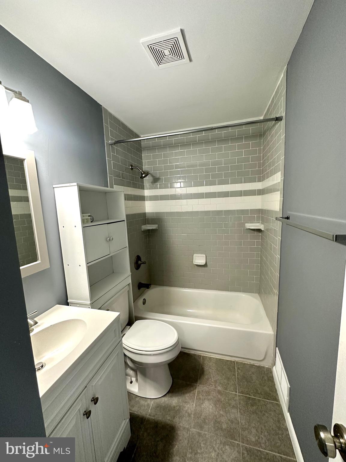 326 Brandon Drive Bear, DE 19701 - Photo 9 of 16 a bathroom with a toilet and a shower