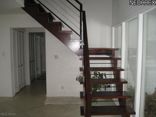 23205 Ranch Road Beachwood, OH 44122 - Photo 7 of 11 Terrific newer floating staircase.