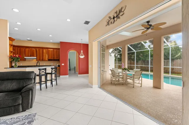 a view of a dining room and a window