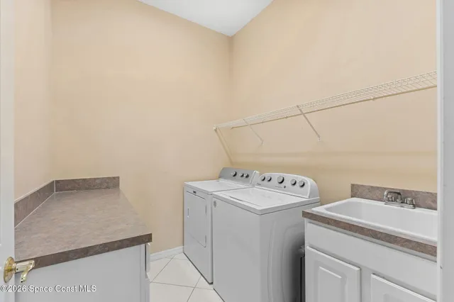 a kitchen with stainless steel appliances granite countertop a stove sink and cabinets