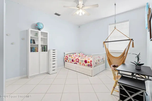 a view of a swimming pool with a balcony