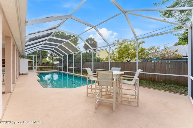 a view of a house with a swimming pool