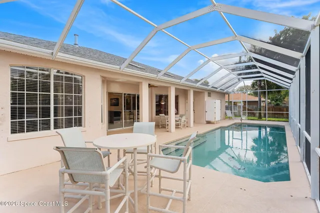 a view of backyard with green space