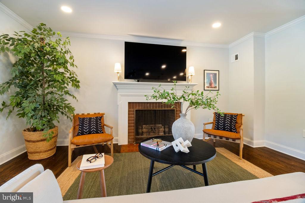 3100 North Glebe Road Arlington, VA 22207 - Photo 16 of 101 a living room with furniture and a fireplace