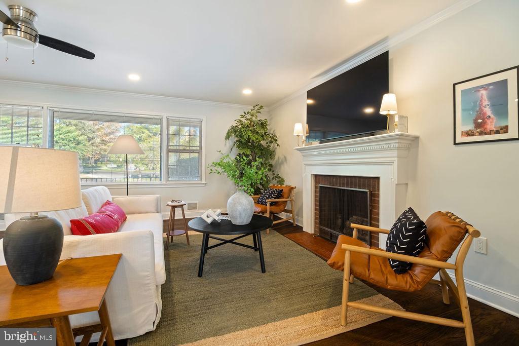 3100 North Glebe Road Arlington, VA 22207 - Photo 17 of 101 a living room with furniture a flat screen tv and a fireplace