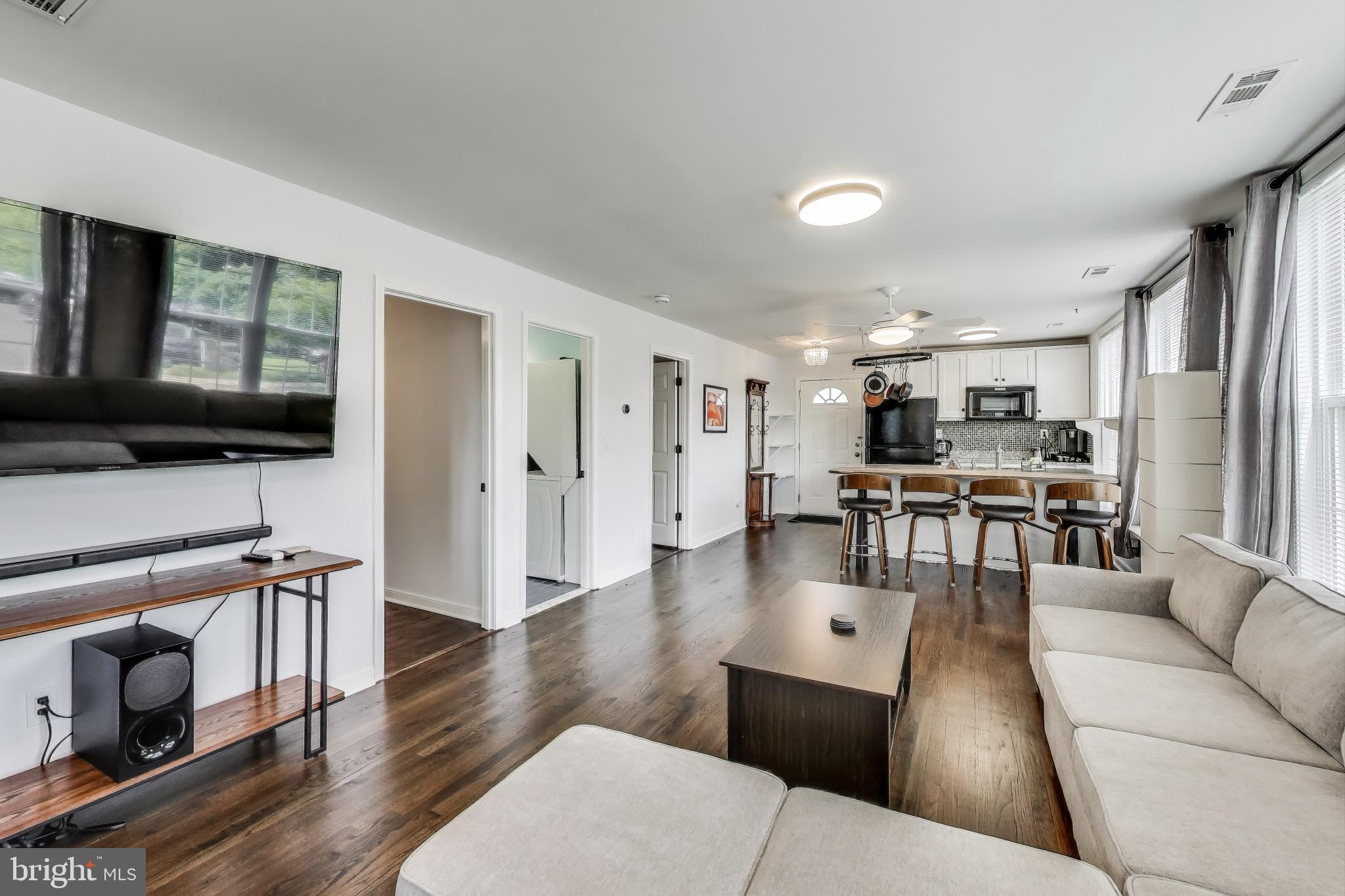 3100 North Glebe Road Arlington, VA 22207 - Photo 71 of 101 a living room with furniture and a flat screen tv
