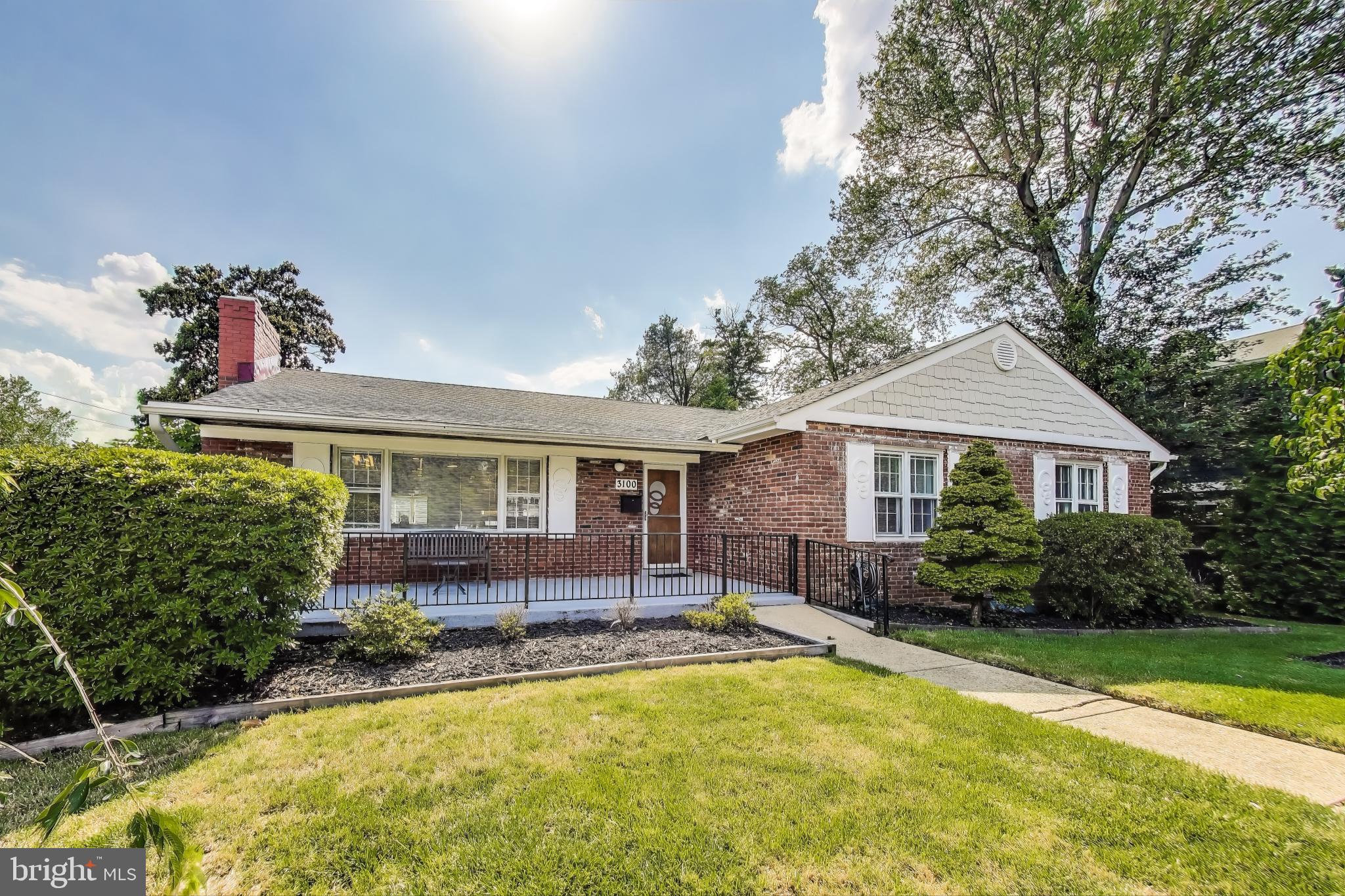 3100 North Glebe Road Arlington, VA 22207 - Photo 90 of 101 a front view of a house with a yard table and chairs