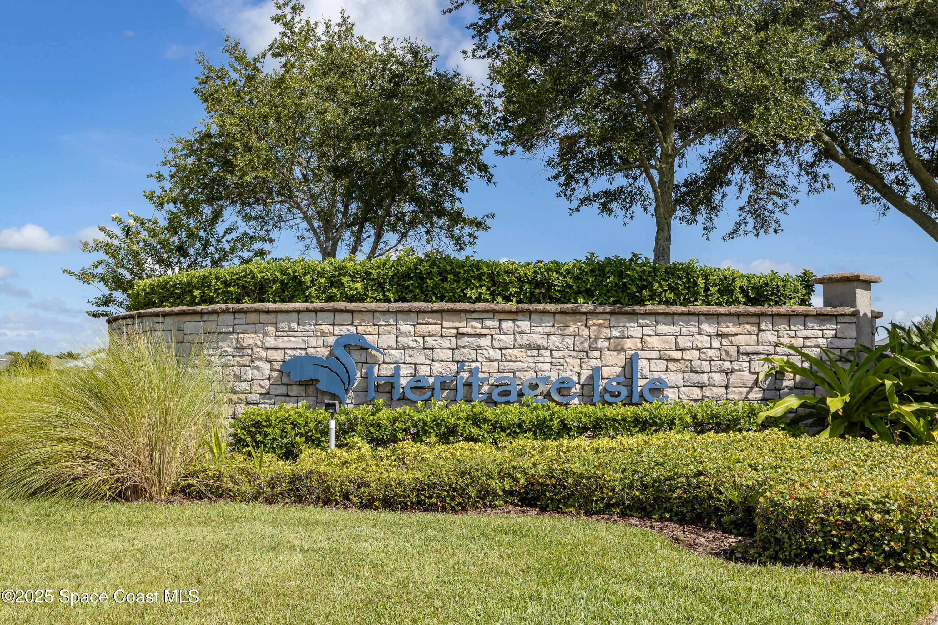 3029 Vallejo Way Melbourne, FL 32940 - Photo 25 of 26 a view of a garden with a bench