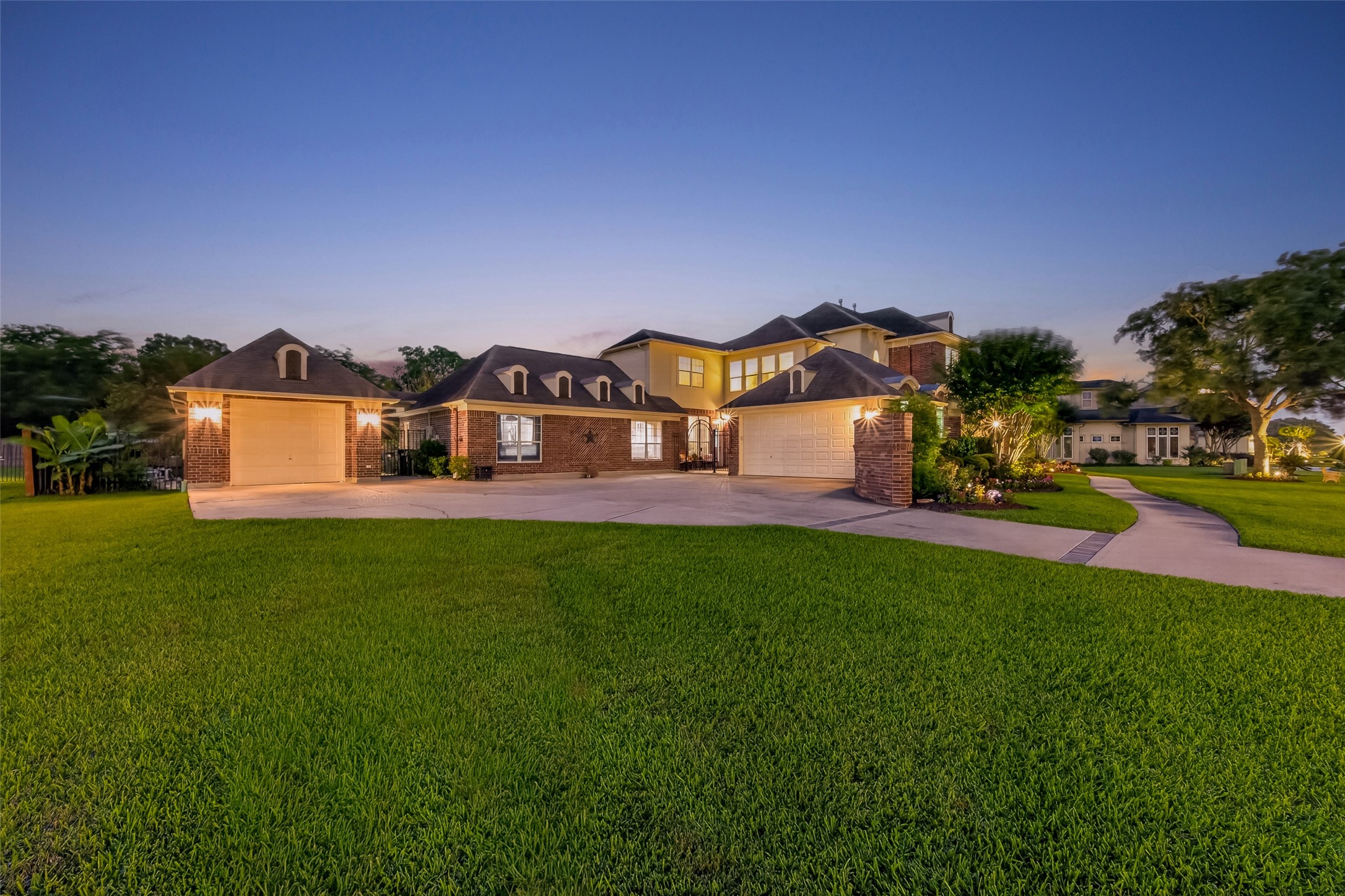 2319 Braer Ridge Drive Katy, TX 77494 - Photo 46 of 50 a view of a big house with a big yard and potted plants