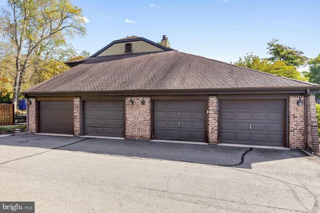 a front view of a house with a garage