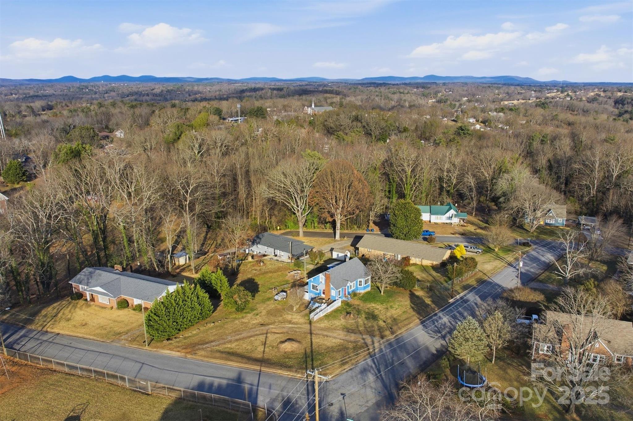 2 Stirling Street Granite Falls, NC 28630 - Photo 27 of 31 a view of a lake with couches in the patio