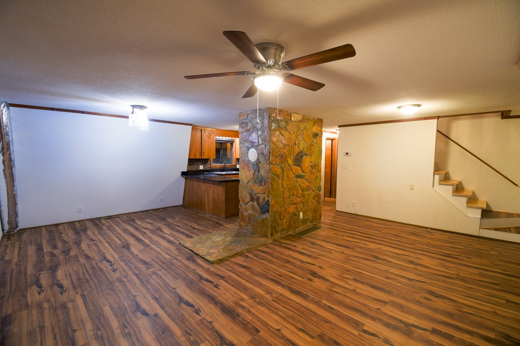 48 Glen Torr Mineral Bluff, GA 30559 - Photo 16 of 25 a view of empty room with wooden floor and fan
