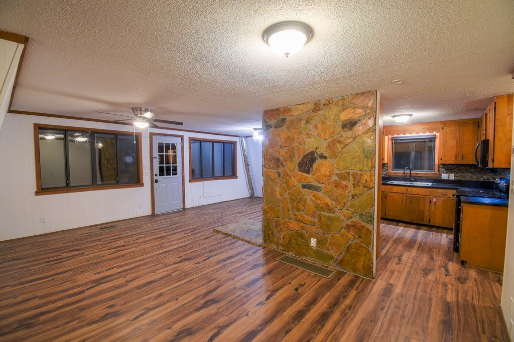 48 Glen Torr Mineral Bluff, GA 30559 - Photo 17 of 25 a view of a kitchen with wooden floor and a kitchen
