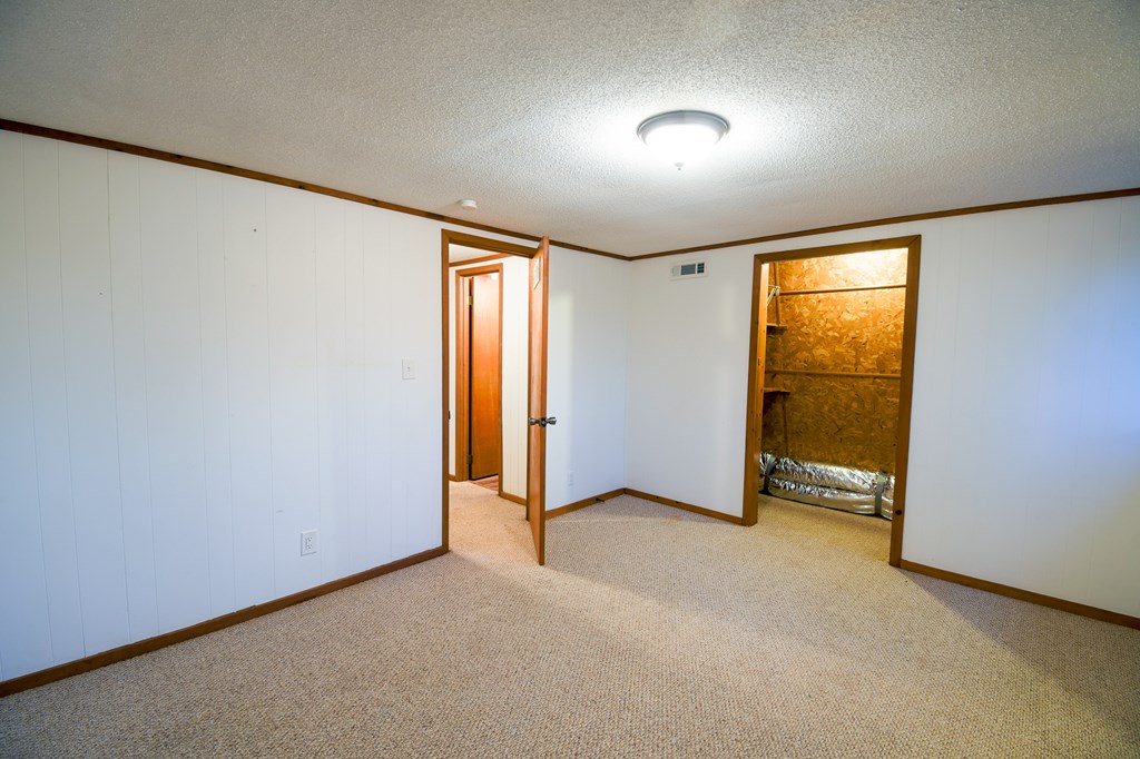 48 Glen Torr Mineral Bluff, GA 30559 - Photo 5 of 25 an empty room with windows