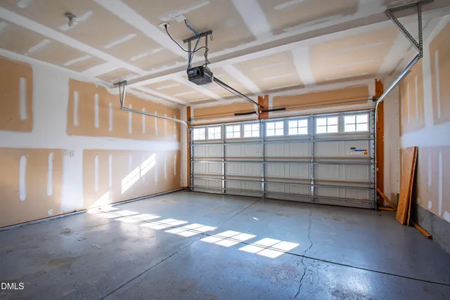 a view of a big room with windows