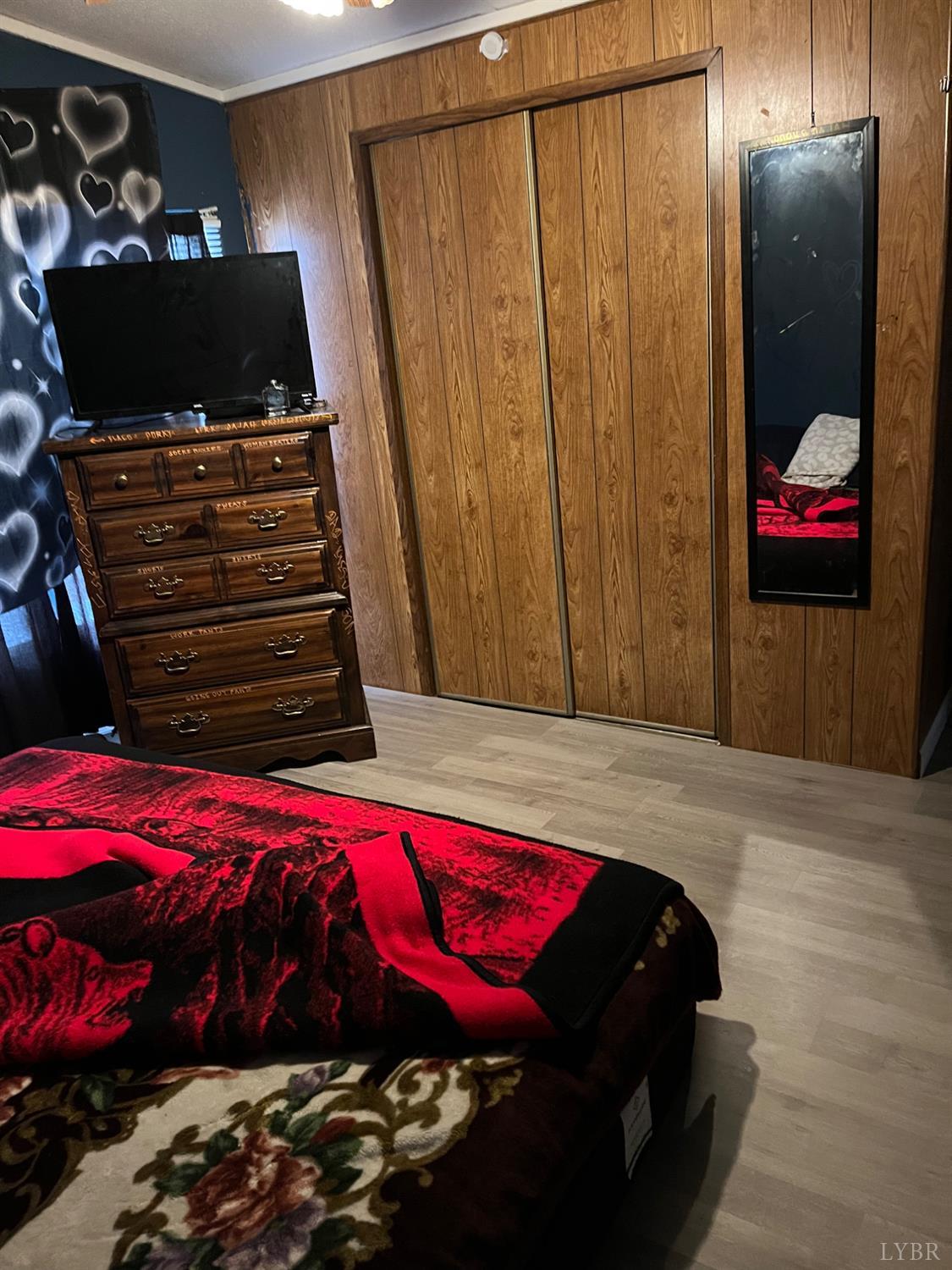 65 June Way Evington, VA 24550 - Photo 11 of 13 a bedroom with a bed and a mirror