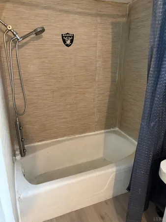 a close view of a bathtub in bathroom