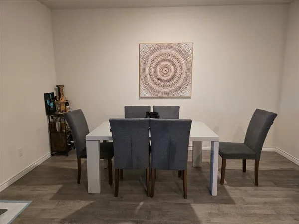 a table and chairs in a room