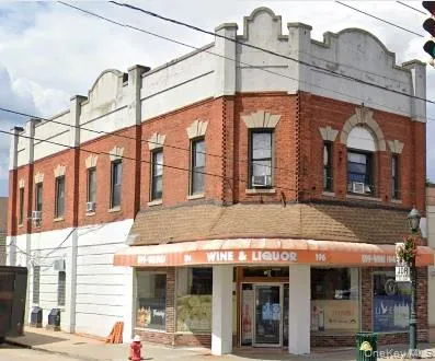 a view of a building with a street