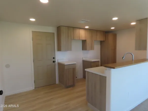 a bathroom with a sink a vanity and a mirror