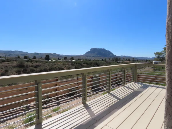a view of a outdoor space with trees in the background