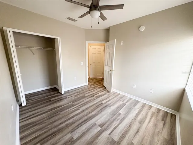 a view of an empty walk in closet