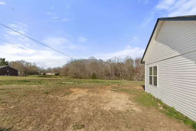 a view of an empty room with window
