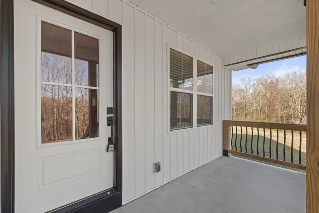 a view of empty room with windows