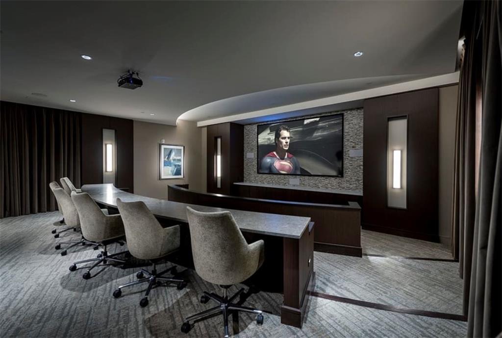 400 Pharr Road Northeast, Unit 231 Atlanta, GA 30305 - Photo 17 of 23 a living room with furniture a rug and painting on wall