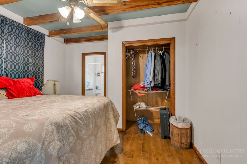 179 Soave Ridge Deep Gap, NC 28618 - Photo 17 of 31 a bed room with a bed and a mirror