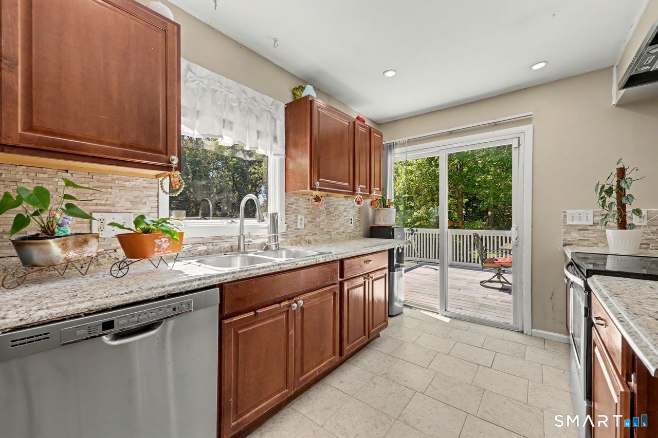 Open to Dining Room, Walk Out to Deck with Seasonal Views of Lake and Gorgeous Sunsets