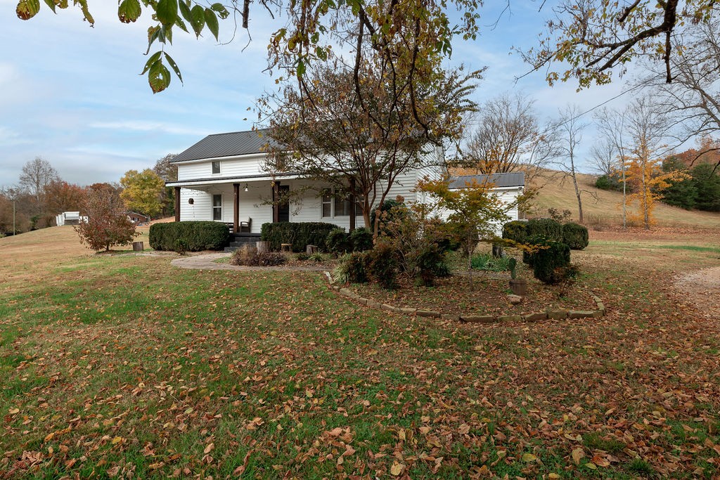 1200 Wray Branch Road Minor Hill, TN 38473 - Photo 11 of 29 a view of a house with a yard