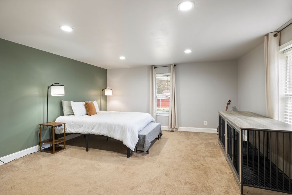 1200 Wray Branch Road Minor Hill, TN 38473 - Photo 12 of 29 a spacious bedroom with a bed and a window