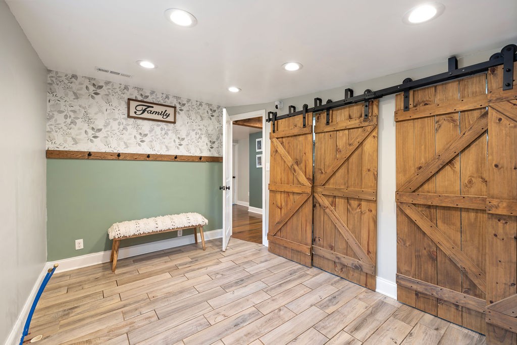 1200 Wray Branch Road Minor Hill, TN 38473 - Photo 18 of 29 a bedroom with a bed and a ceiling fan