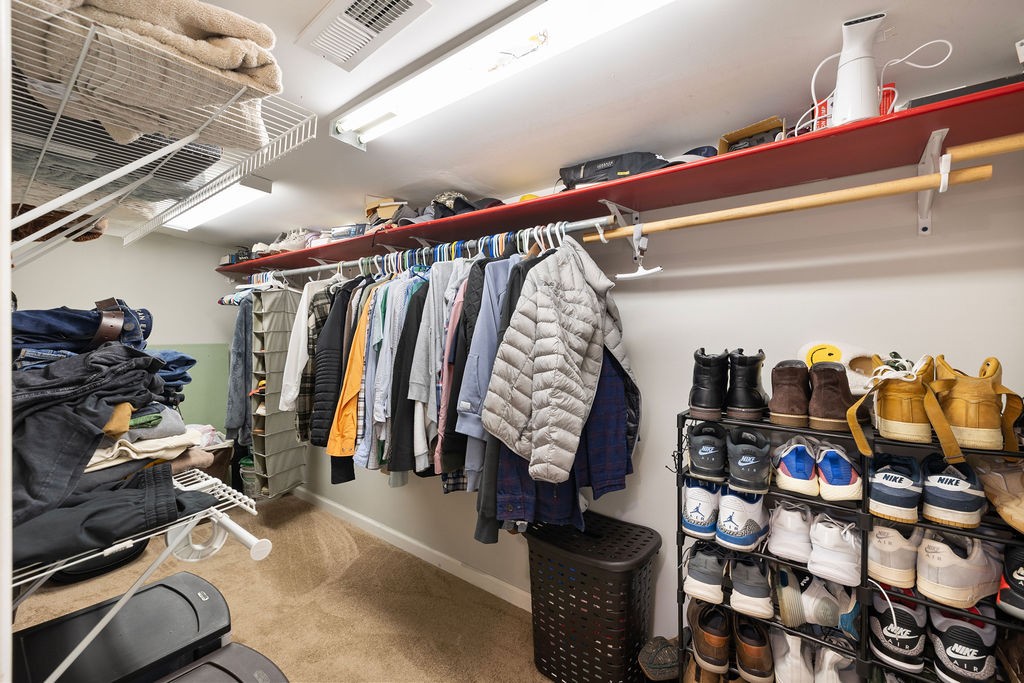 1200 Wray Branch Road Minor Hill, TN 38473 - Photo 19 of 29 a view of walk in closet with clothes and shoes