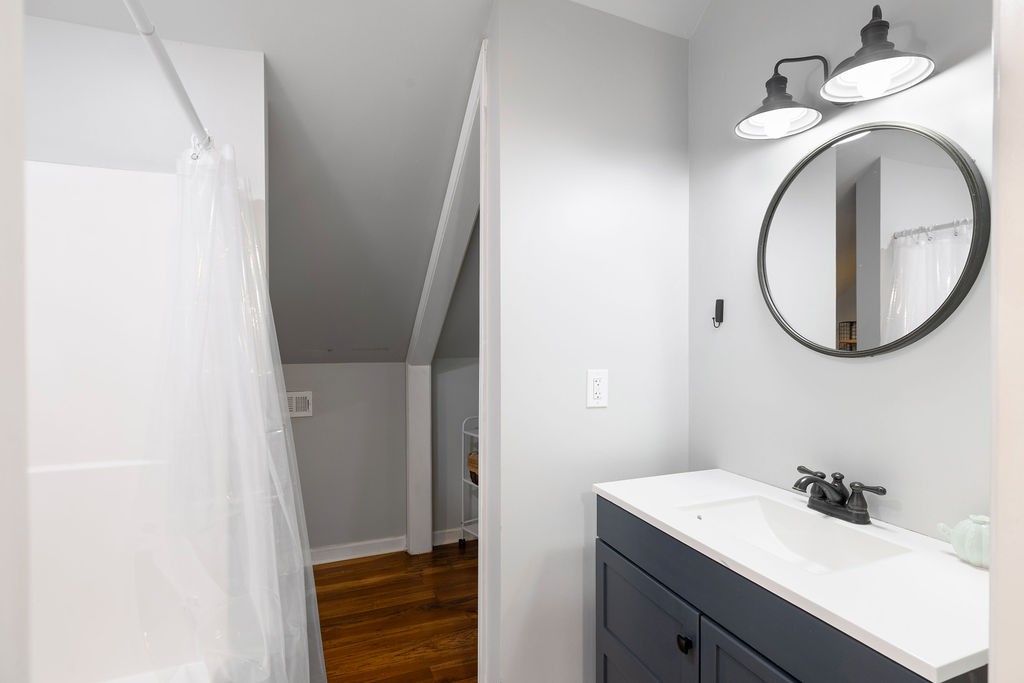 1200 Wray Branch Road Minor Hill, TN 38473 - Photo 23 of 29 a bathroom with a sink and a mirror