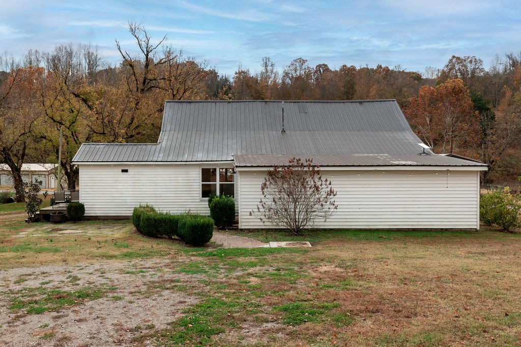 1200 Wray Branch Road Minor Hill, TN 38473 - Photo 27 of 29 a view of a house with a garden