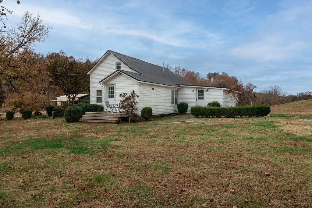 1200 Wray Branch Road Minor Hill, TN 38473 - Photo 29 of 29 a house view with a garden space