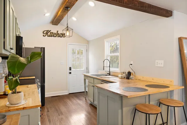 a bathroom with a sink and a stove