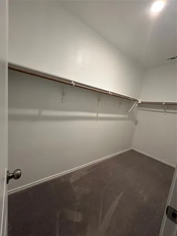 a bathroom with a sink toilet and a mirror