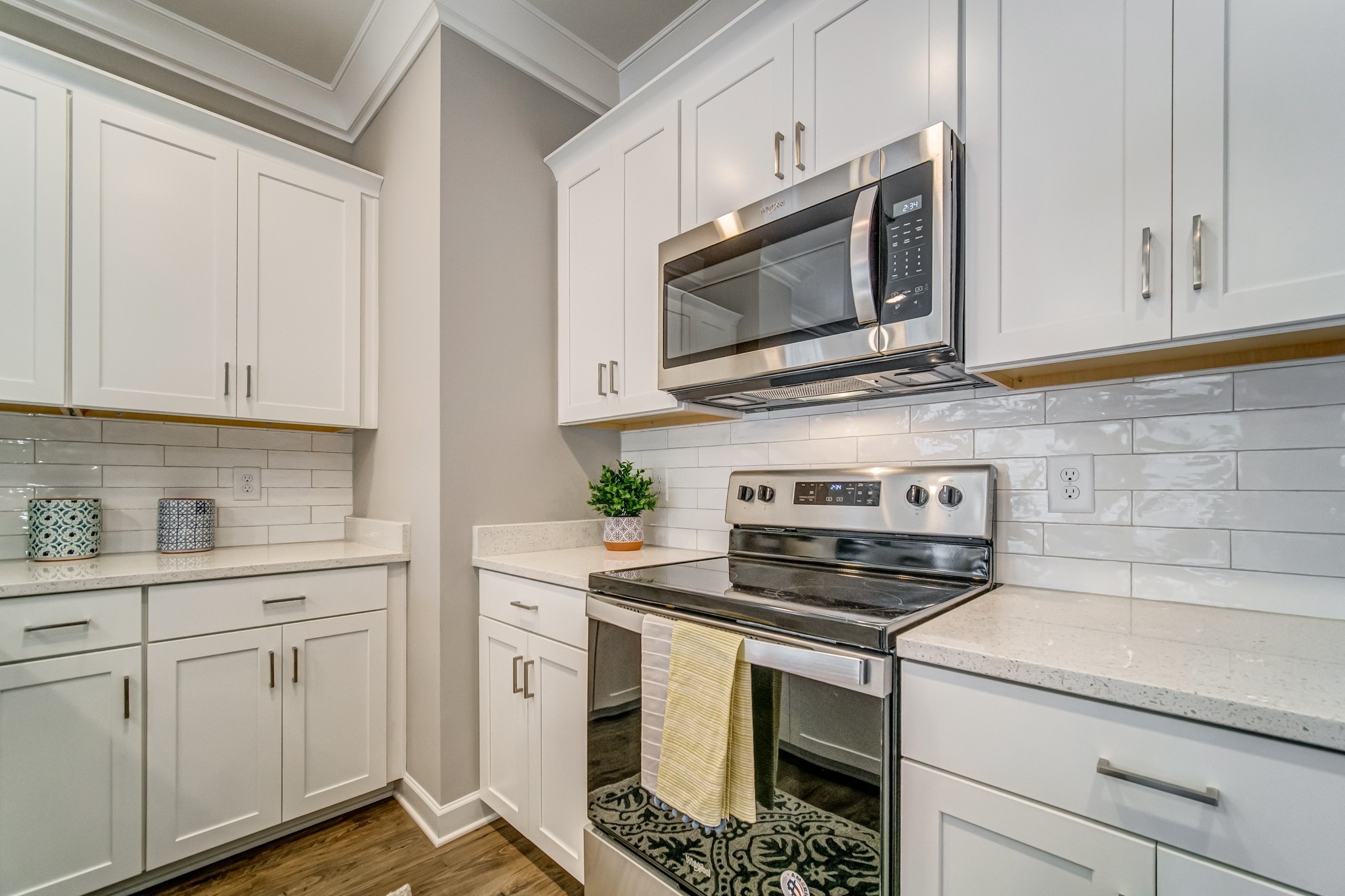 446 Withrow Way Gallatin, TN 37066 - Photo 12 of 25 a kitchen with white cabinets stainless steel appliances and sink