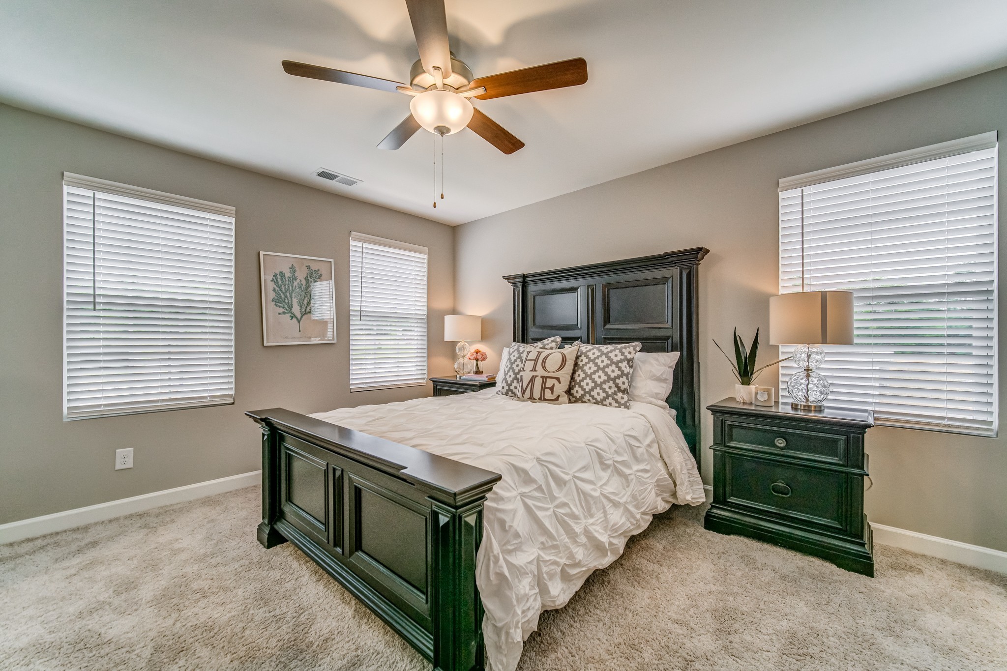 446 Withrow Way Gallatin, TN 37066 - Photo 17 of 25 a bedroom with a bed and a chandelier
