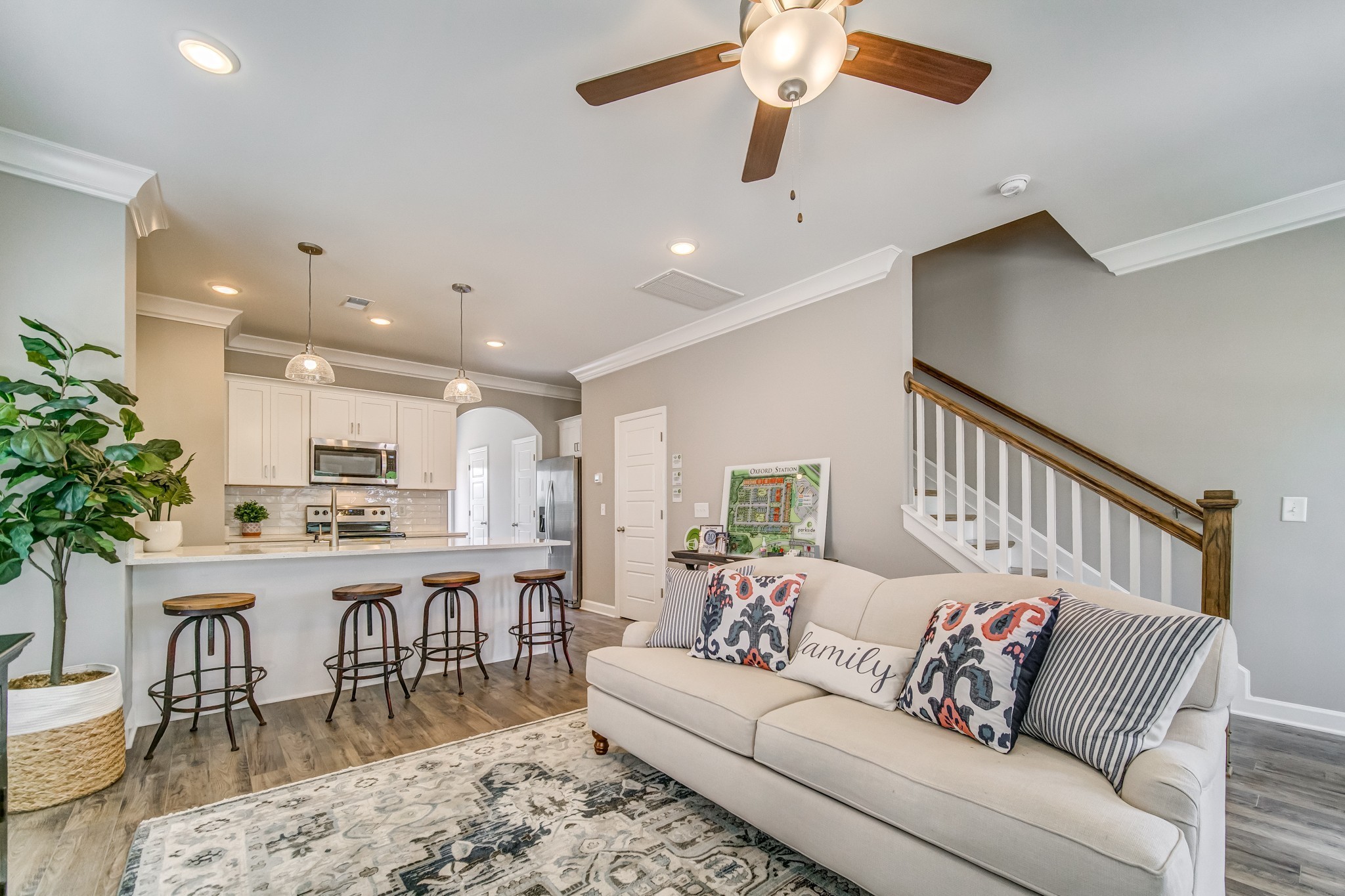 446 Withrow Way Gallatin, TN 37066 - Photo 4 of 25 a living room with furniture kitchen view and a potted plant