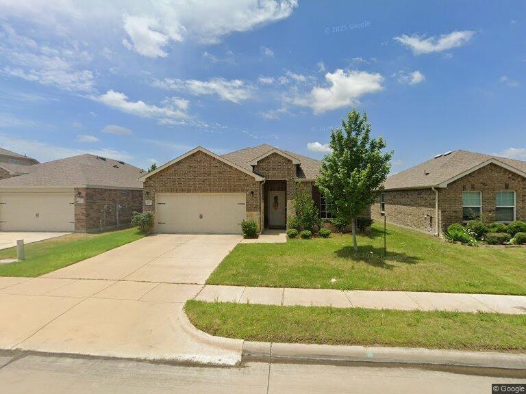 2213 Heaton Street Forney, TX 75126 - Photo 1 of 14 Brick facade residence with a light-colored entry door