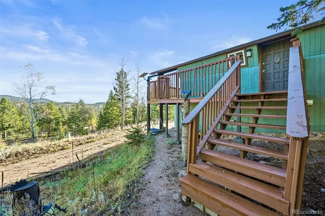 a view of stairs and yard