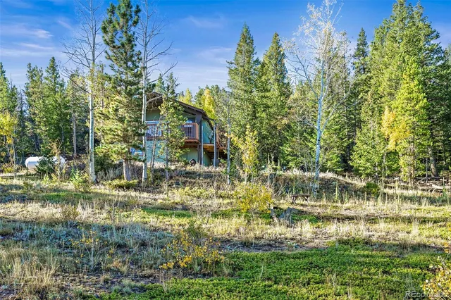 a view of swimming pool from a lake view