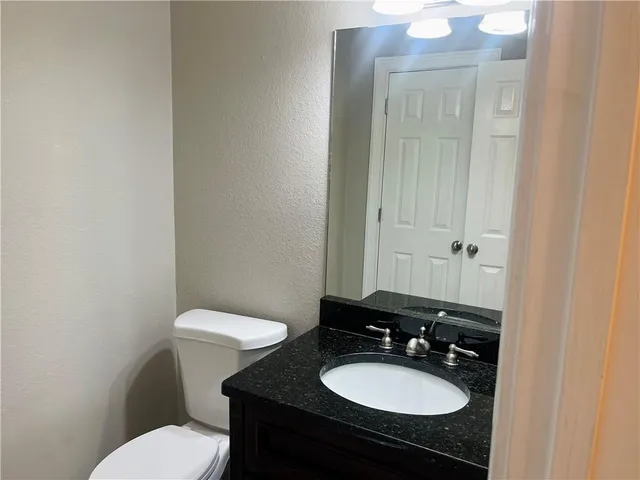 a bathroom with a sink and a toilet